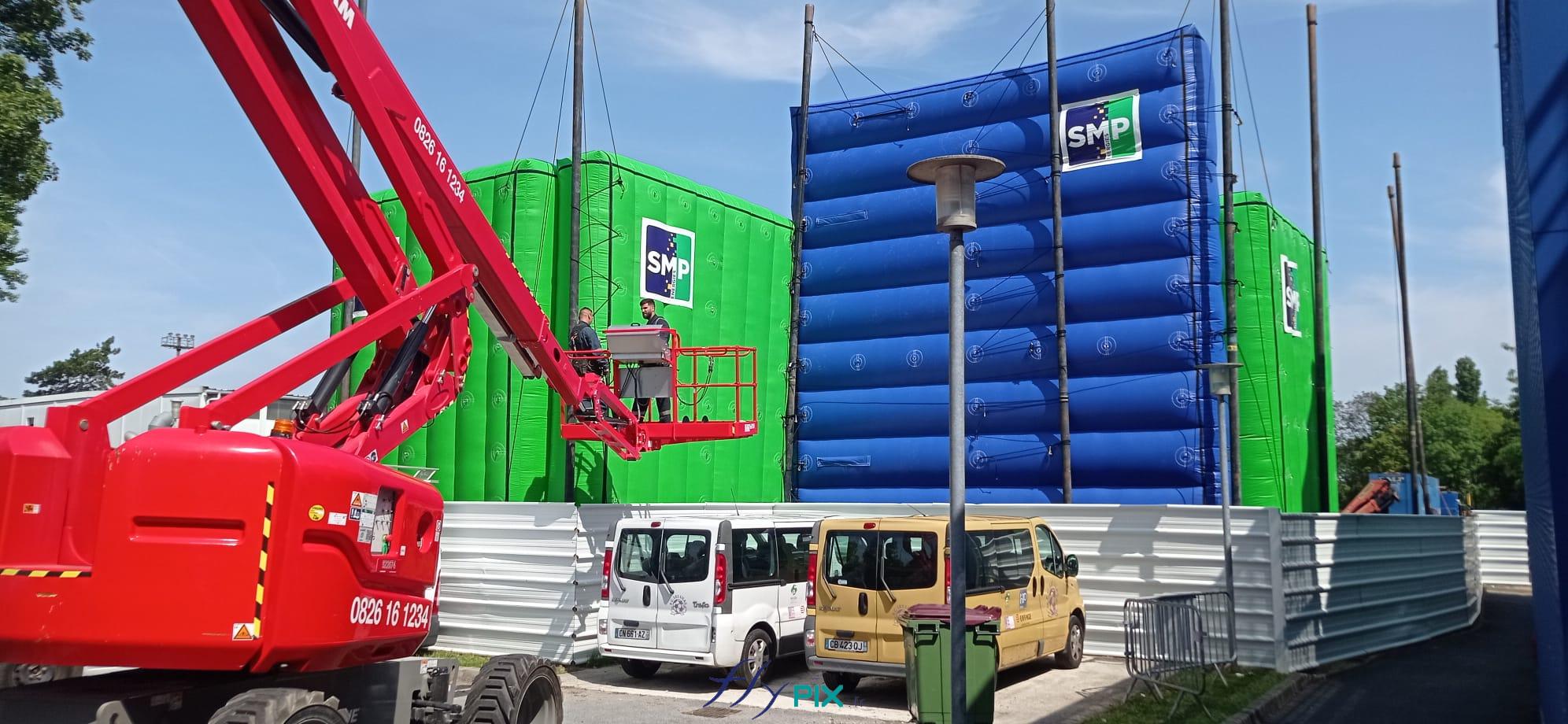 Chantier pose installation murs gonflables reduction bruits SMP DRILLING enveloppe PVC 045mm ventiles turbine permanence 13